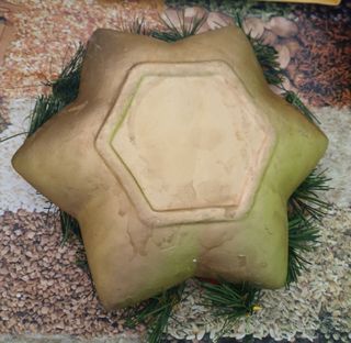 Centrotavola con candela natalizia