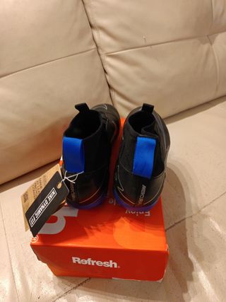 Zapatos de fútbol Nike para niño negros