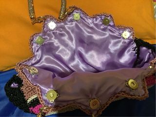 Elegante borsa a ventaglio fatta a mano