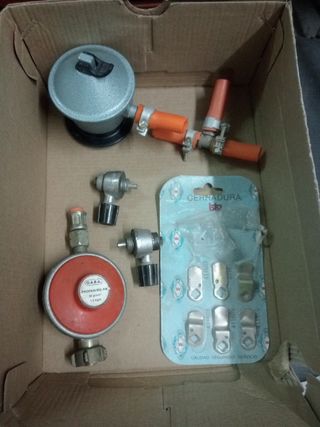 Regulador y piezas para bombona de gas