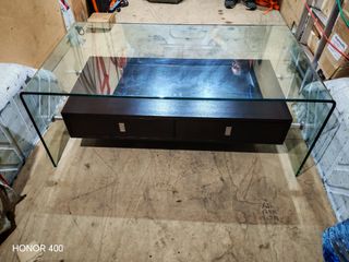 Mesa de centro cristal y madera.