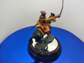 Figura de soldado a caballo