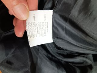 Giacca smanicata con cappuccio