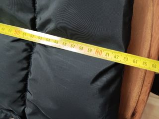 Giacca smanicata con cappuccio