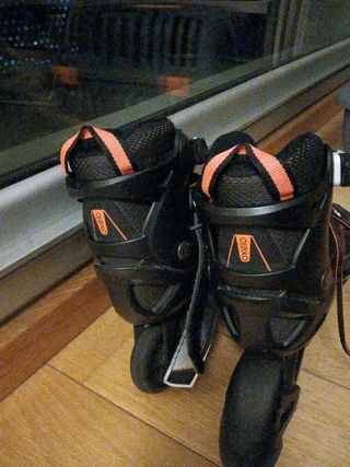 Patines en línea negros con cordones naranjas32_35