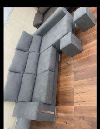 Sofá modular gris de tela