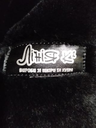 Abrigo largo de piel con cuello y puños de pelo