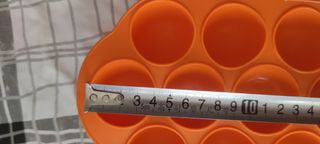 Molde de silicona naranja para 15 cubitos