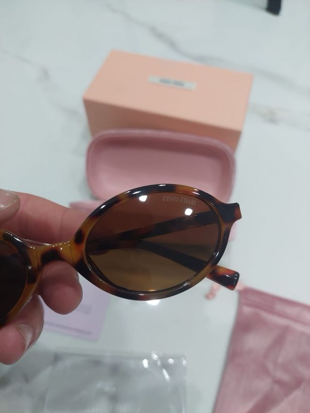 Occhiali da sole Miu Miu Tortora