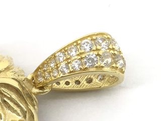 colgante oro 18k con piedra con esmeralda