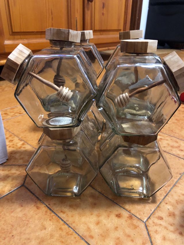 Botes de cristal con mielero