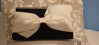 Bolso de fiesta negro y blanco con lazo
