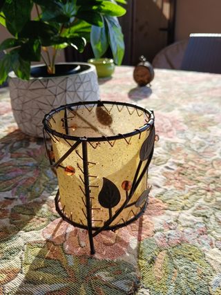 Porta candela in ferro decorato