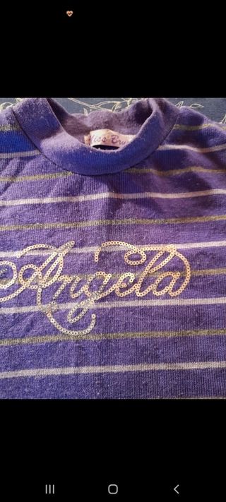 Maglia a righe viola con scritta Angela 9 anni