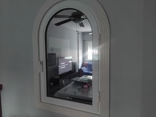 Ventana espejo decorativa