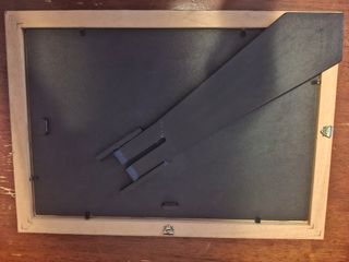 Cornice in legno con vetro