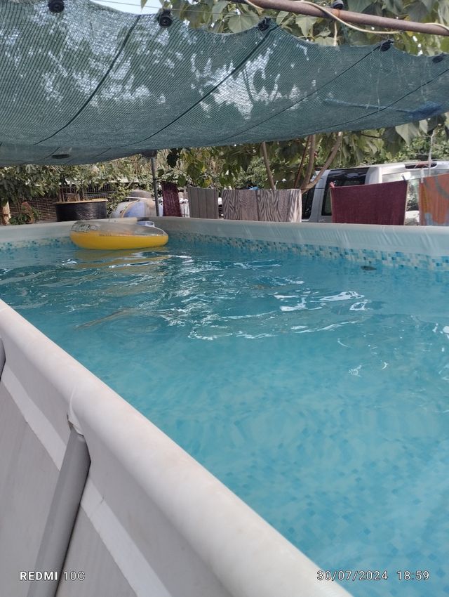 Piscina plegable azul y blanca 6,5de largo 3 ancho