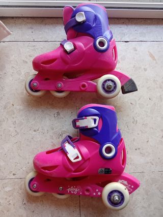 Patines ajustables rosas y morados niña. 