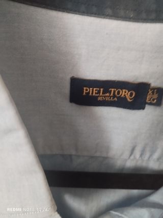 Camisa Piel de Toro Talla XL aunque no muy grande
