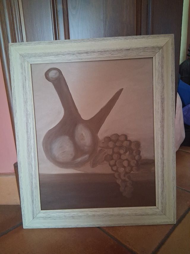 Cuadro rústico con marco de madera beige. A mano