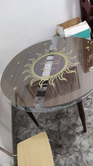 Cristal redondo con sol dorado