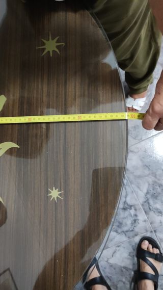 Cristal redondo con sol dorado