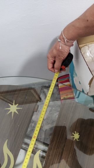 Cristal redondo con sol dorado