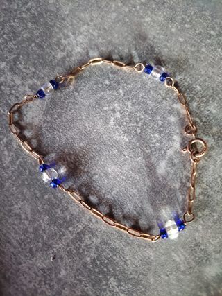 Pulsera Goldfield con bolitas azules y transparent