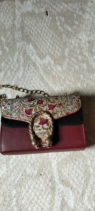 Bolso de fiesta burdeos y dorado tipo cartera cade