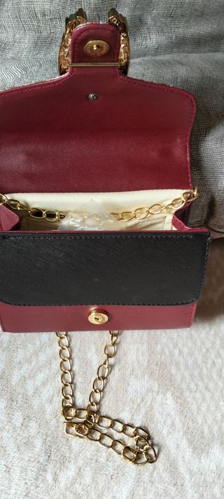 Bolso de fiesta burdeos y dorado tipo cartera cade