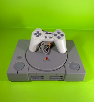 PS1 grigio + Pad non Sony + cavi