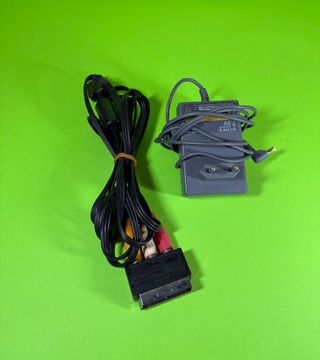 PS1 grigio + Pad non Sony + cavi