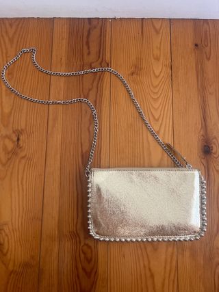 Bolso de fiesta dorado con cadena