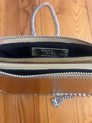 Bolso de fiesta dorado con cadena