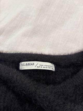 Jersey negro peludo