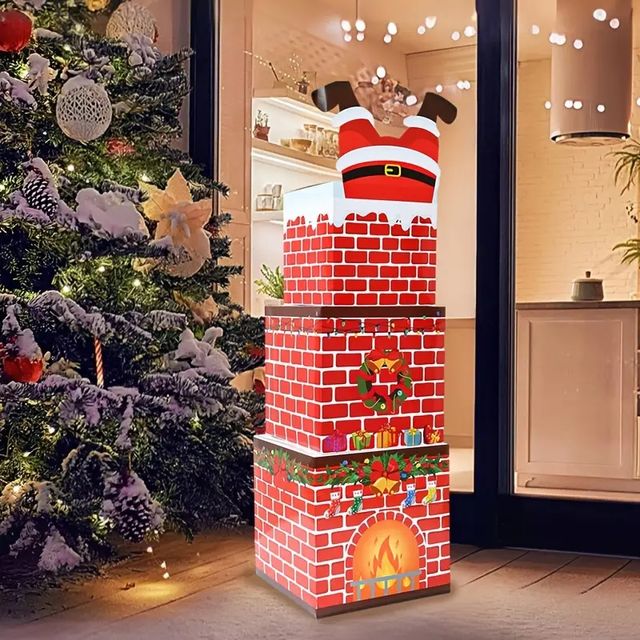 Pila di scatole decorative natalizie