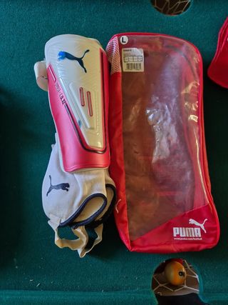Espinilleras Puma Talla L con bolsa y tobillera.