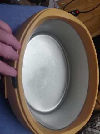 Calentador de parafina naranja