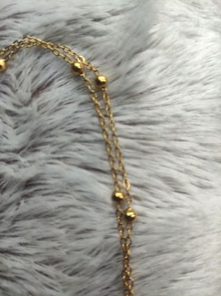 Doble cadena dorada con bolitas