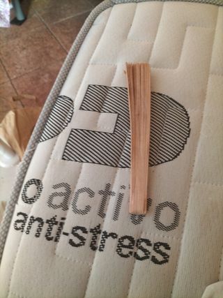 Abanico de madera tallada