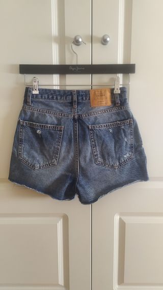 Falda pantalón vaquera desgastada