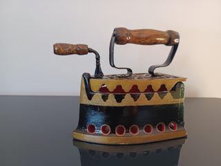 Plancha de carbón en hierro fundido, Arte Italiano