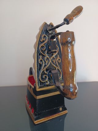 Plancha de carbón en hierro fundido, Arte Italiano