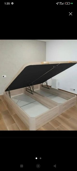 Canapé abatible con cabecero tapizado