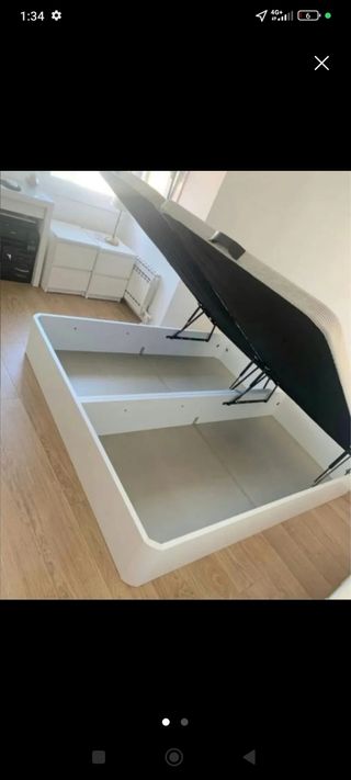 Canapé abatible con cabecero tapizado
