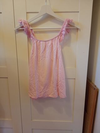 Blusa rosa con volantes