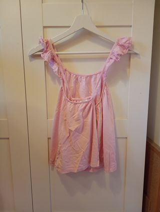 Blusa rosa con volantes
