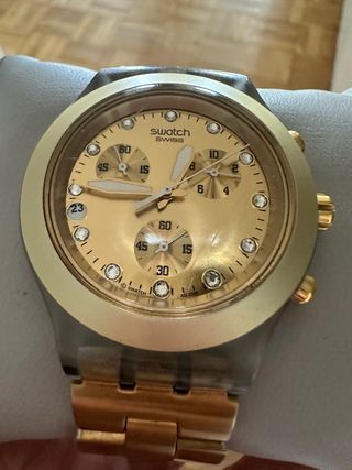 Exclusivo Reloj Swatch Irony Dorado y Transparente
