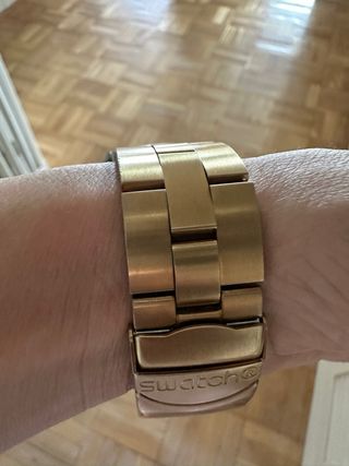 Exclusivo Reloj Swatch Irony Dorado y Transparente