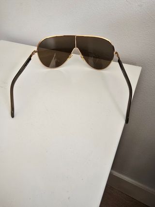 Gafas de sol estilo visor doradas